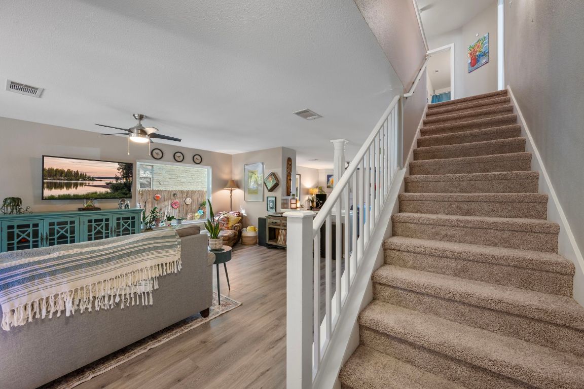 1607 Azalea Drive Cedar Park, TX 78613 - Photo 15 of 40 a view of entryway and hall with wooden floor