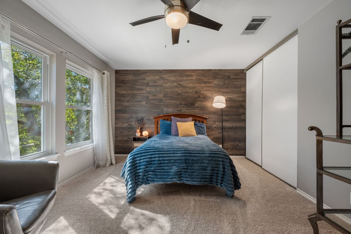 1607 Azalea Drive Cedar Park, TX 78613 - Photo 20 of 40 a bedroom with a bed and window