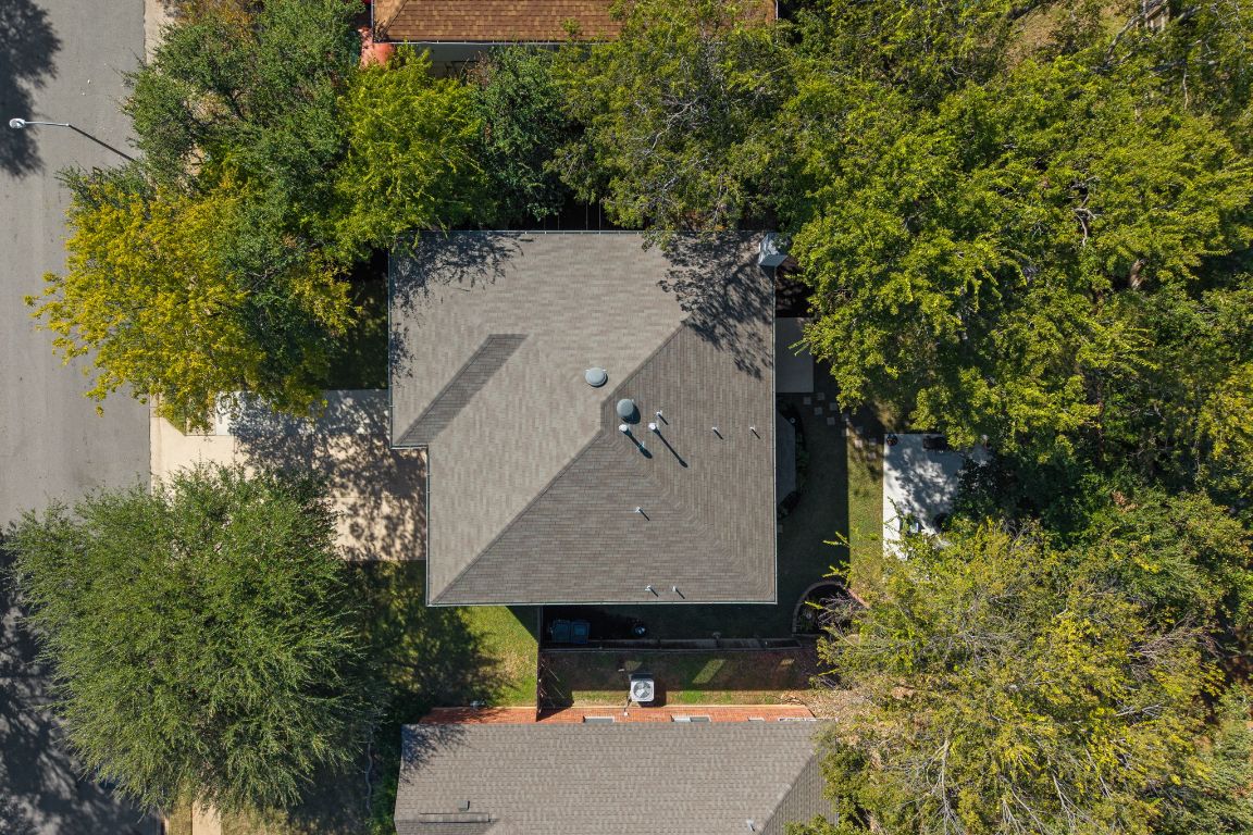 1607 Azalea Drive Cedar Park, TX 78613 - Photo 31 of 40 an aerial view of a house with a yard and large trees