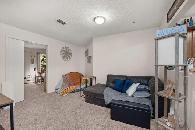 a bedroom with furniture and a couch