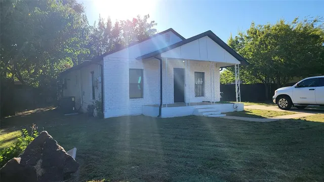 a view of pool with a yard