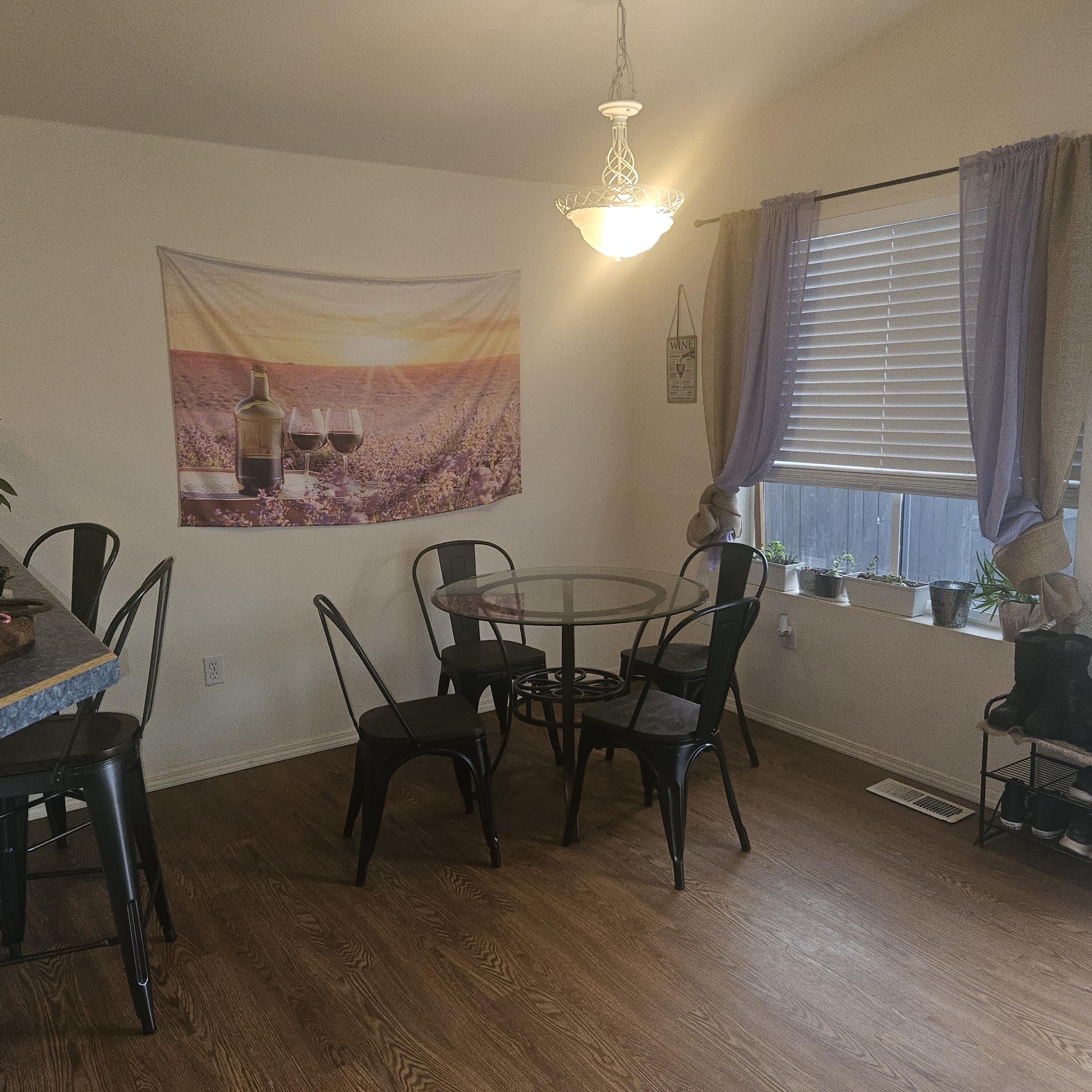 569 Northeast Negus Loop Redmond, OR 97756 - Photo 26 of 32 a view of a dining room with furniture window and wooden floor