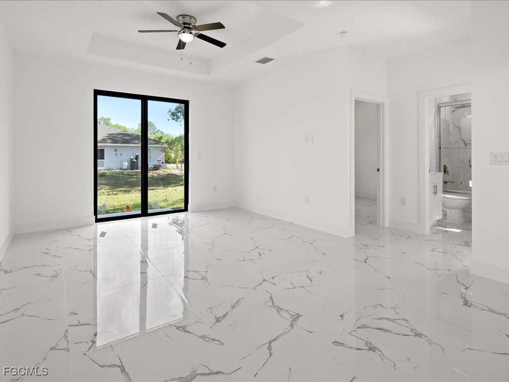 5210 28th Street Southwest Lehigh Acres, FL 33973 - Photo 8 of 12 a view of an empty room