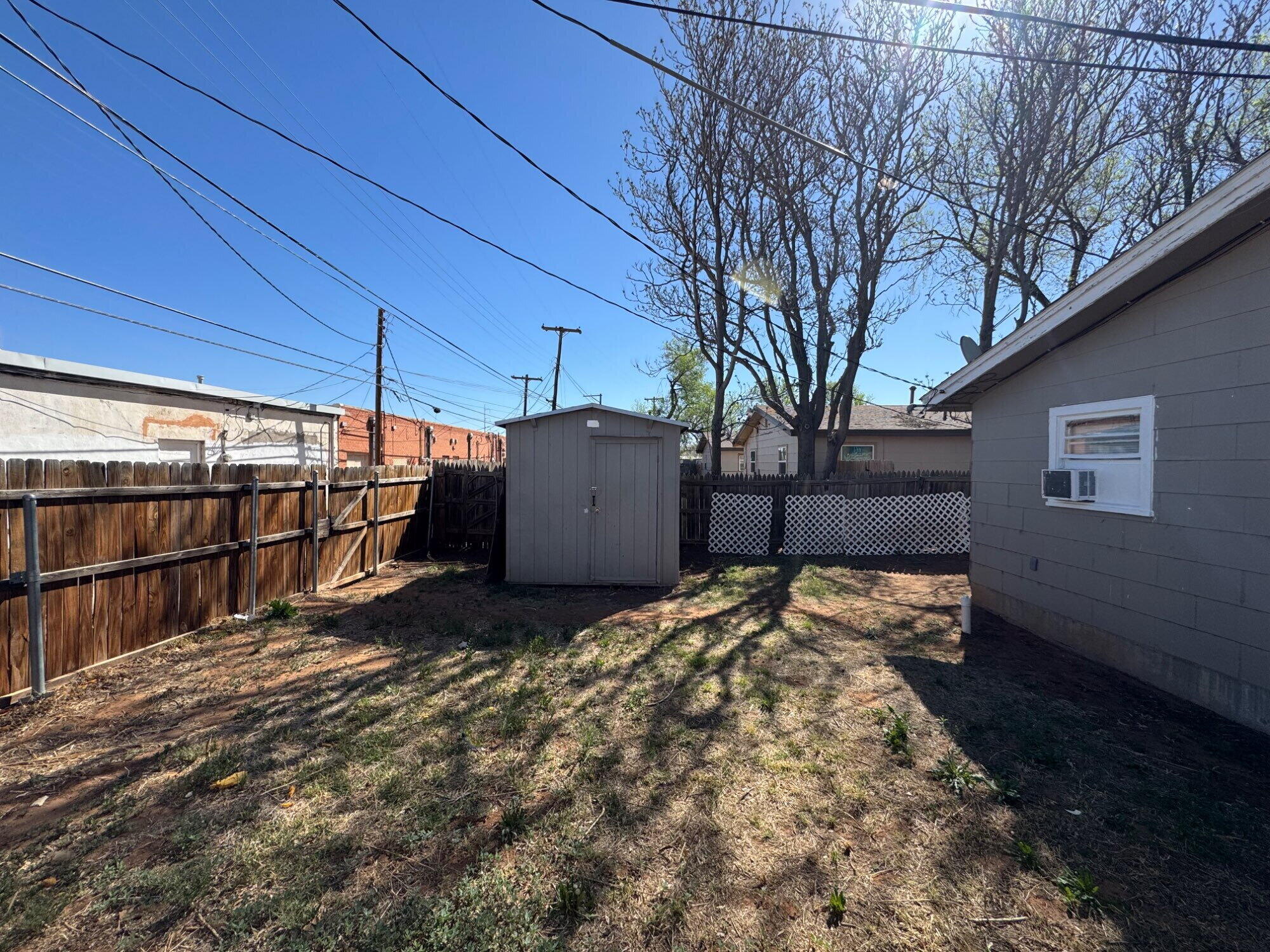 2208 35th Street, Unit B Lubbock, TX 79412 - Photo 9 of 9 a view of a backyard of the house
