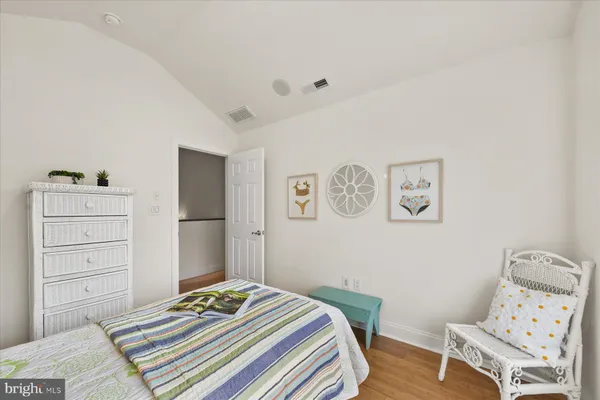 a bedroom with a bed and furniture