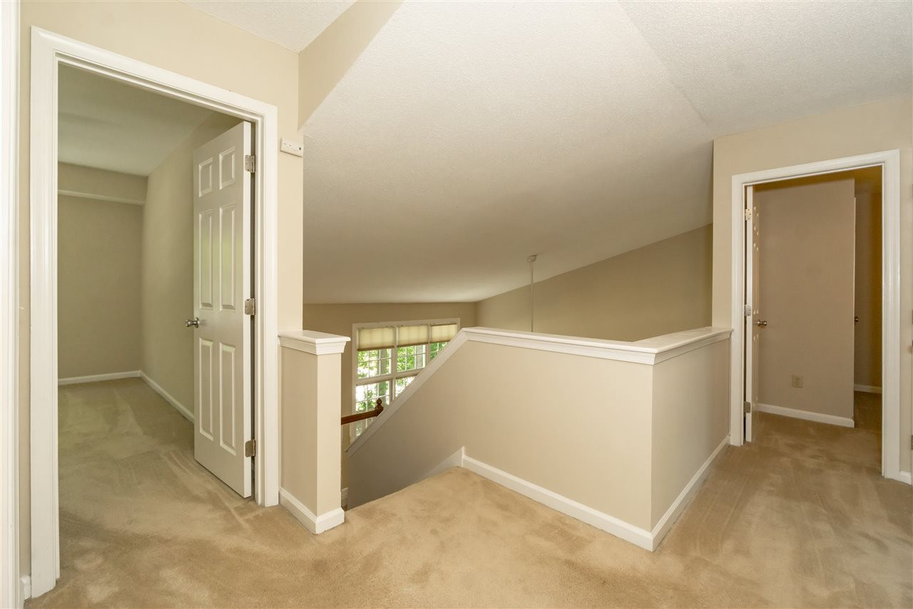 8113 Coleraine Court Raleigh, NC 27615 - Photo 15 of 28 Upstairs Hallway