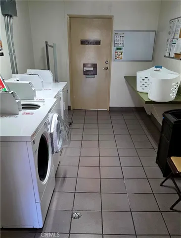 a view of a storage & utility room with washer and dryer