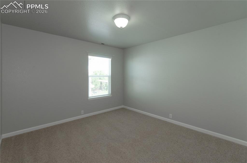 9443 St.George Road Peyton, CO 80831 - Photo 34 of 45 an empty room with a window