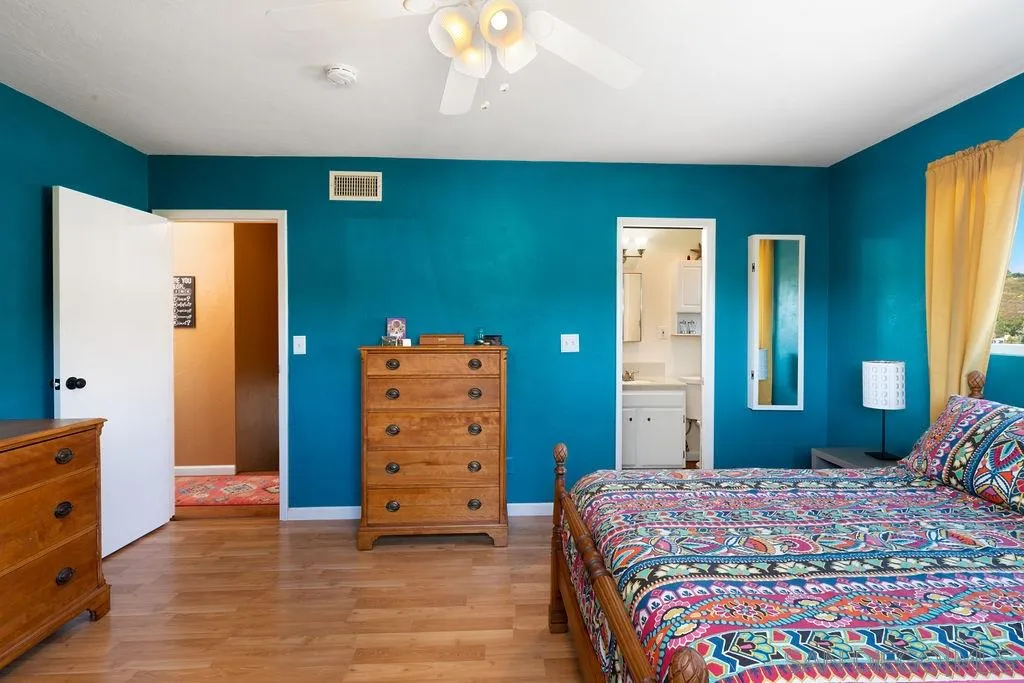 14134 Lyons Valley Road Jamul, CA 91935 - Photo 13 of 25 a bedroom with a bed and a dresser