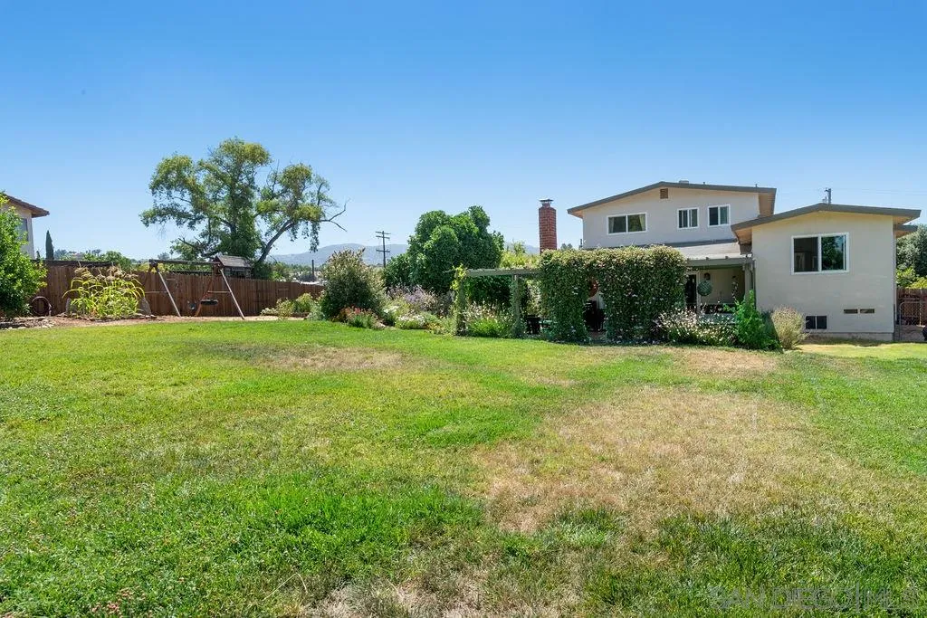 14134 Lyons Valley Road Jamul, CA 91935 - Photo 22 of 25 a front view of a house with a yard