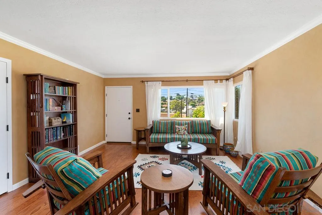 14134 Lyons Valley Road Jamul, CA 91935 - Photo 4 of 25 a view of a dining room with furniture window and wooden floor