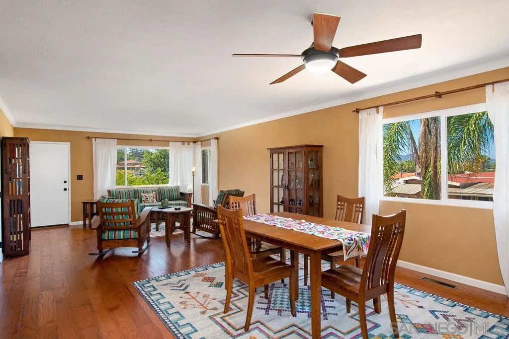14134 Lyons Valley Road Jamul, CA 91935 - Photo 6 of 25 a view of a dining room with furniture window and wooden floor