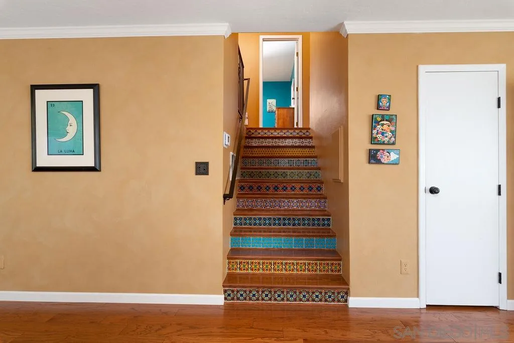14134 Lyons Valley Road Jamul, CA 91935 - Photo 10 of 25 a view of a hallway with stairs and wooden floor
