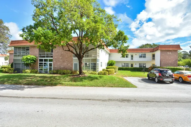 a view of street with parked cars
