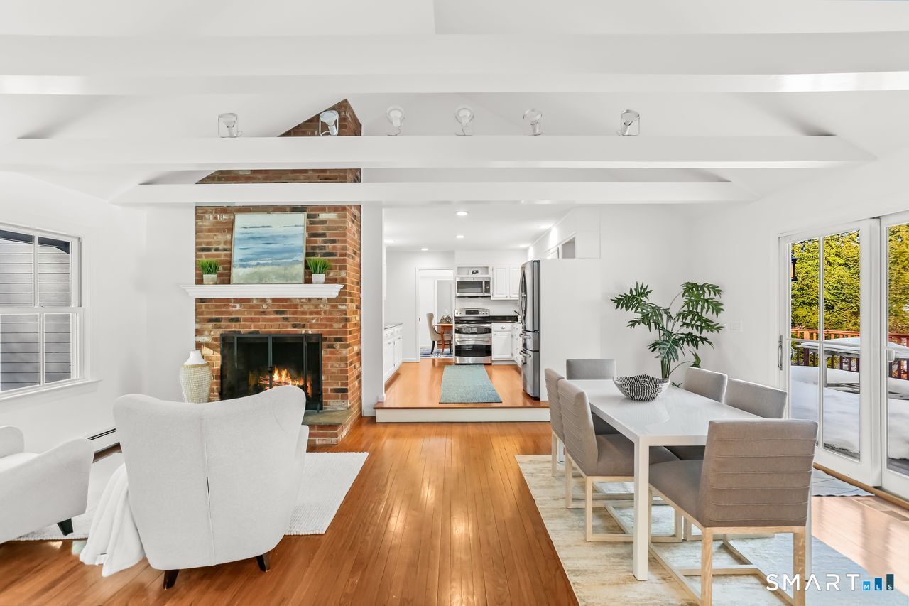103 Davis Hill Road Weston, CT 06883 - Photo 11 of 37 a view of a dining room with furniture window and wooden floor