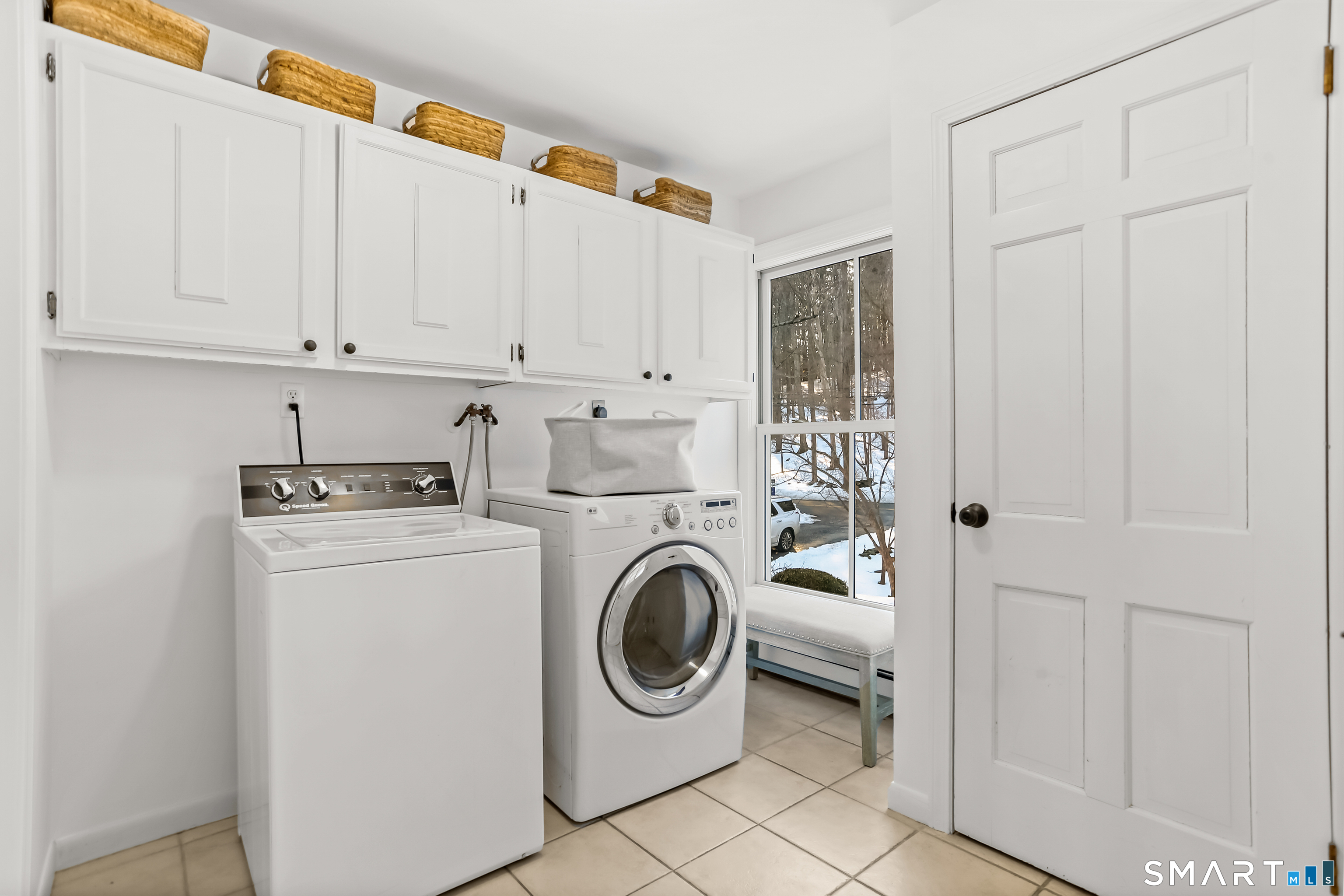 103 Davis Hill Road Weston, CT 06883 - Photo 16 of 37 a utility room with dryer and washer