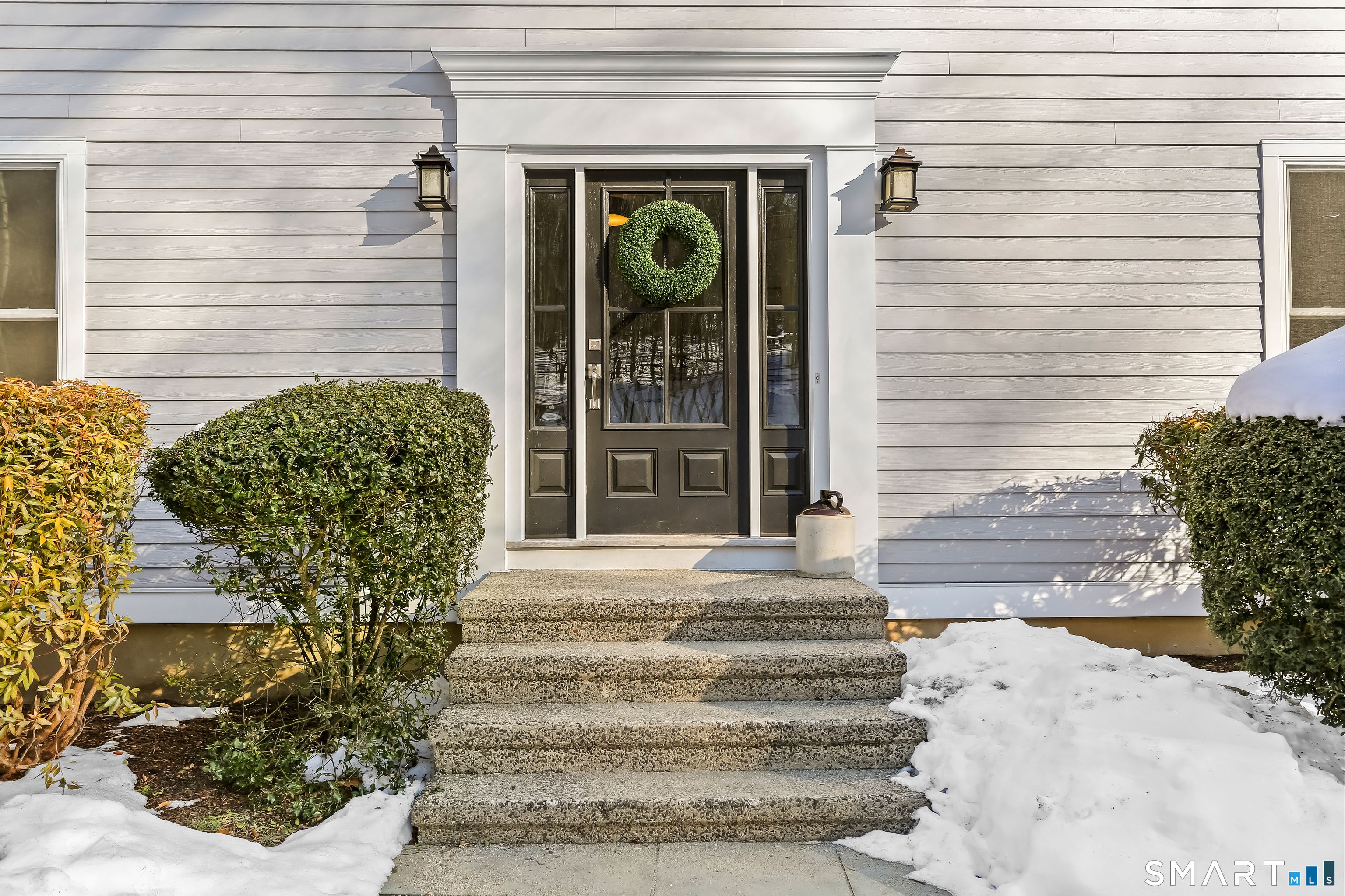103 Davis Hill Road Weston, CT 06883 - Photo 3 of 37 a view of a house with a door and a window