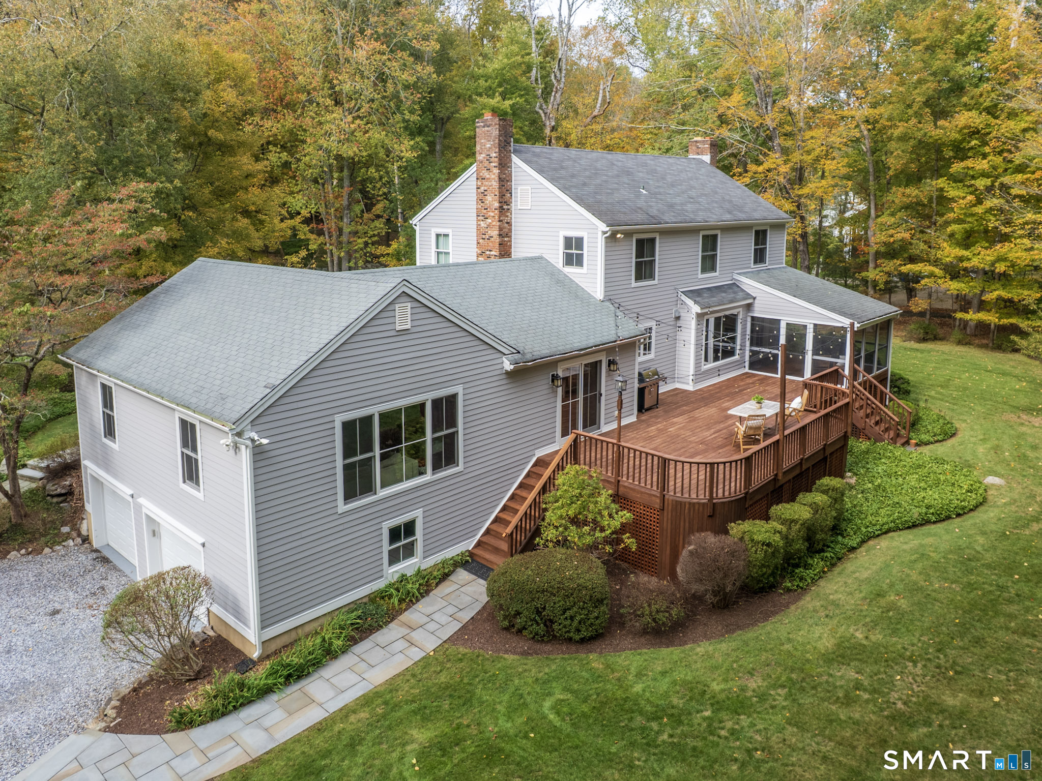 103 Davis Hill Road Weston, CT 06883 - Photo 34 of 37 a aerial view of a house next to a yard