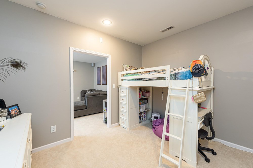 8451 Reedy Ridge Lane Raleigh, NC 27613 - Photo 25 of 30 Room features two closets and has access to full bath. 3rd Bedroom/Flex Room