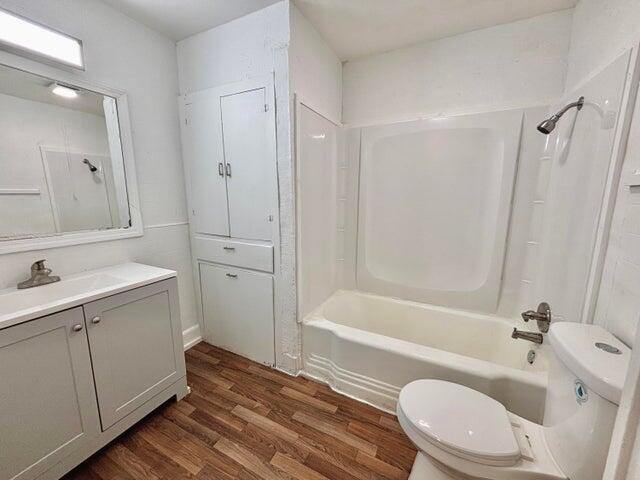 420 West Lynn Street Slaton, TX 79364 - Photo 21 of 25 a bathroom with a sink toilet and shower