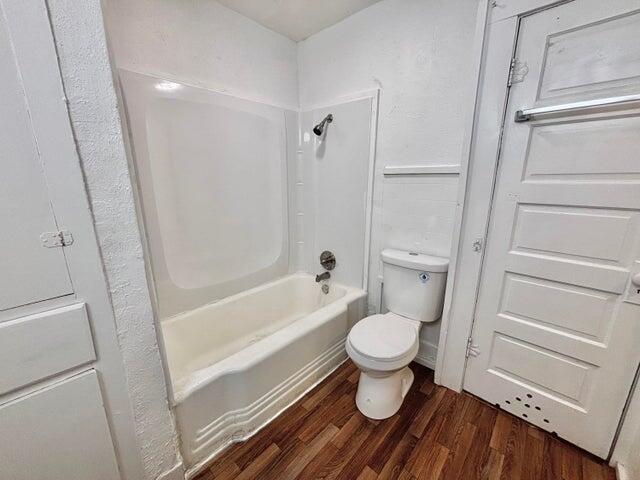 420 West Lynn Street Slaton, TX 79364 - Photo 22 of 25 a bathroom with a sink toilet and shower