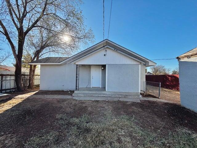 420 West Lynn Street Slaton, TX 79364 - Photo 24 of 25 a view of a house with a yard and garage