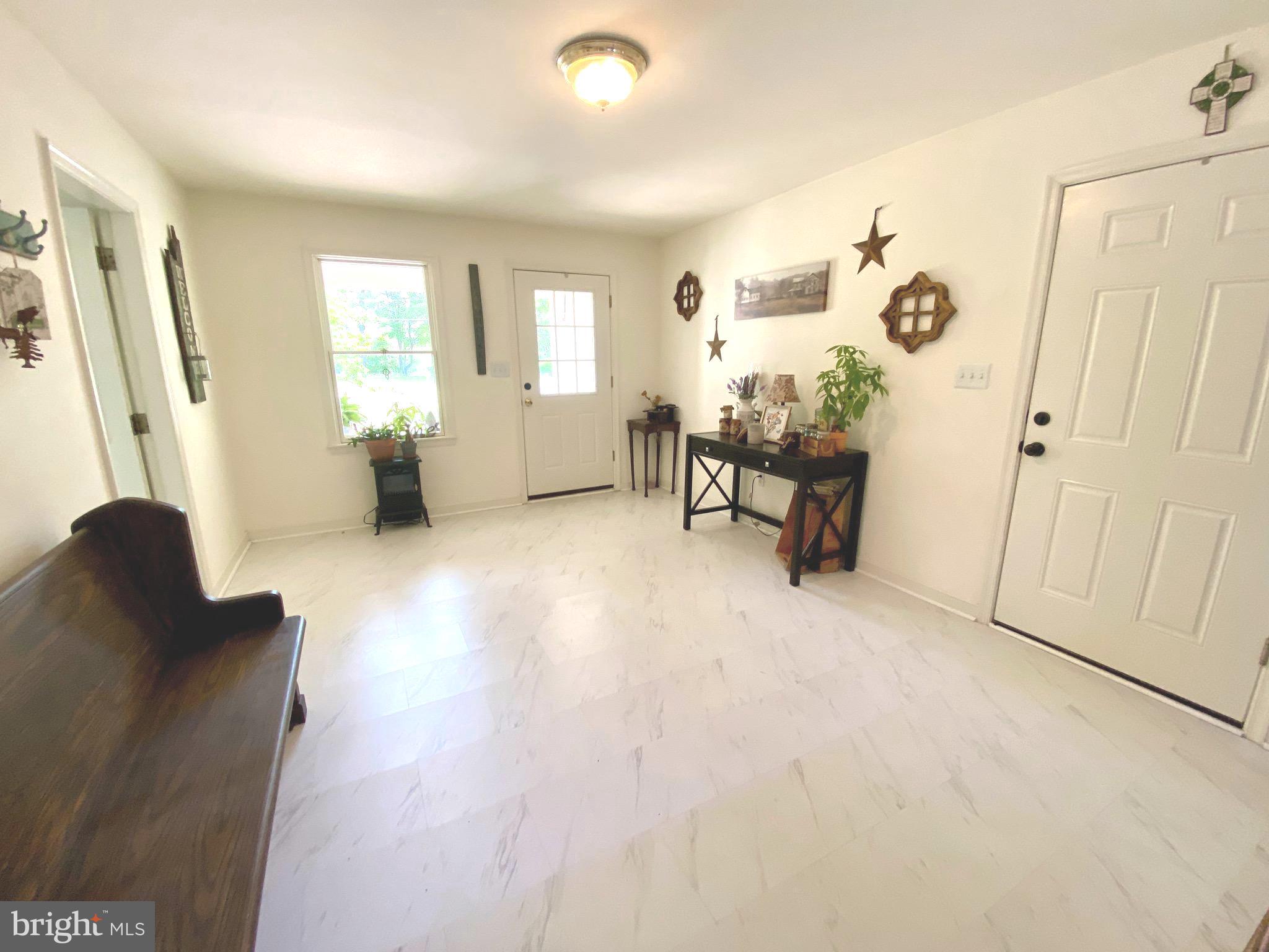 1039 Mountain View Road Fredericksburg, VA 22406 - Photo 13 of 49 Flex space off garage & 2nd entrance w/LVT floors