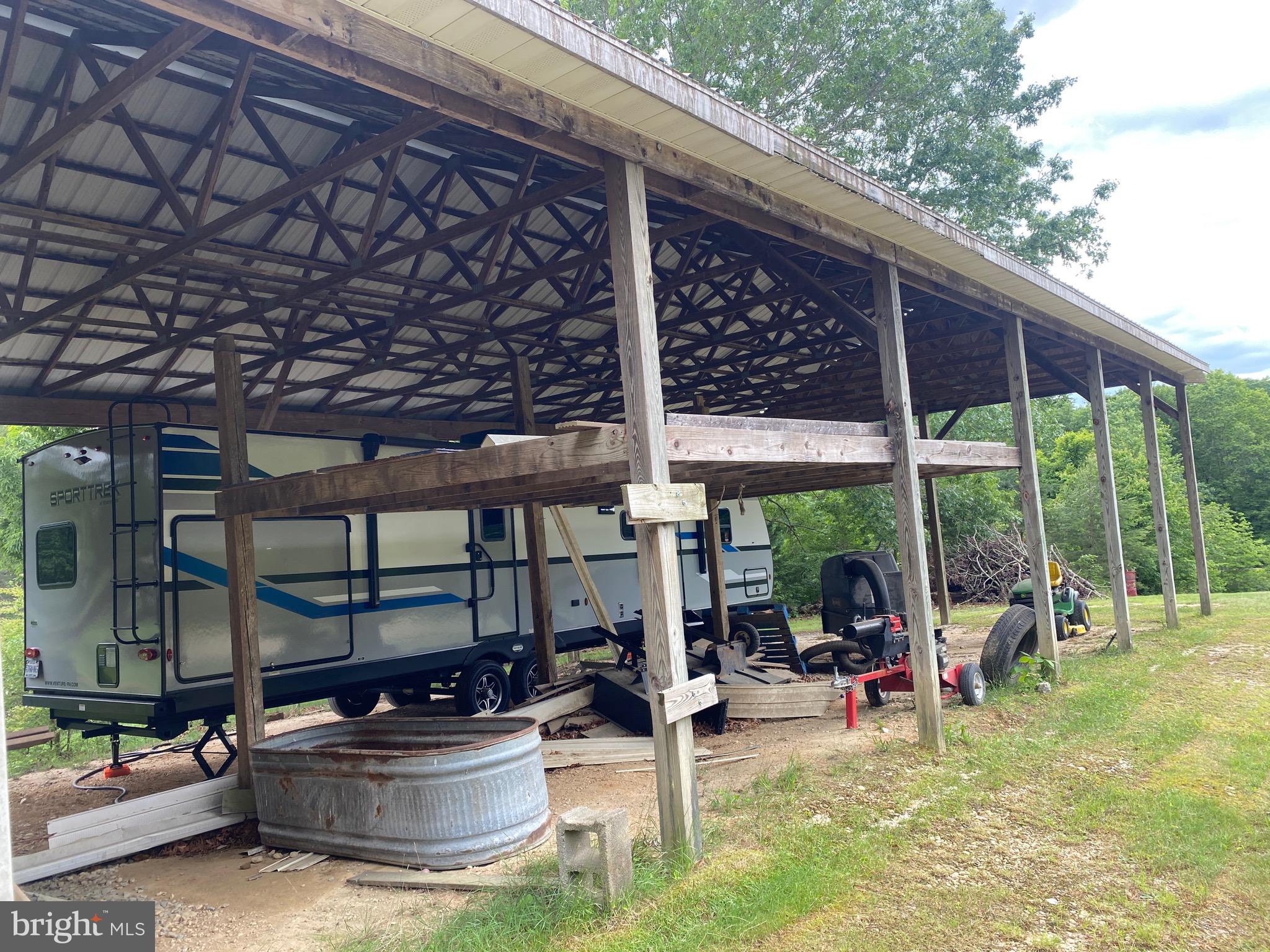 1039 Mountain View Road Fredericksburg, VA 22406 - Photo 36 of 49 60 ft carport off the rear of the detached garage!