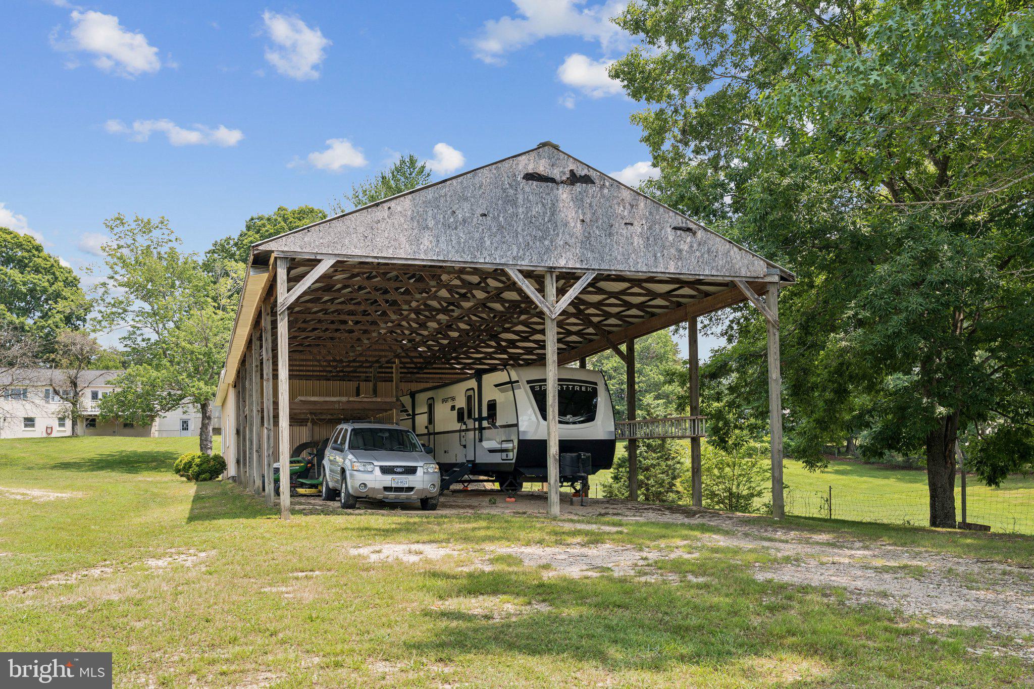1039 Mountain View Road Fredericksburg, VA 22406 - Photo 37 of 49 60 ft carport off the rear of the detached garage!