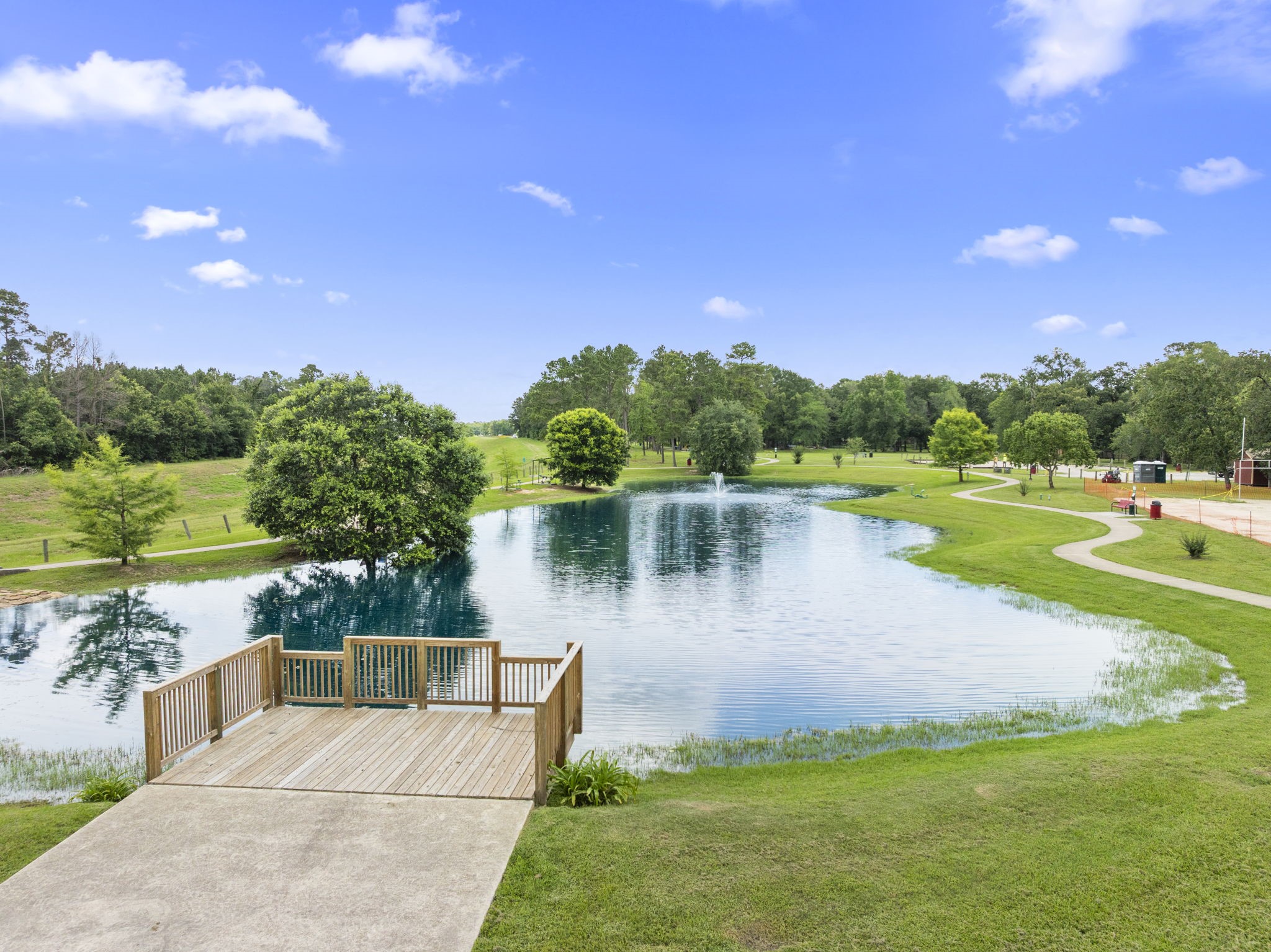 29106 Foxingham Circle Spring, TX 77386 - Photo 39 of 47 a view of a lake with a yard