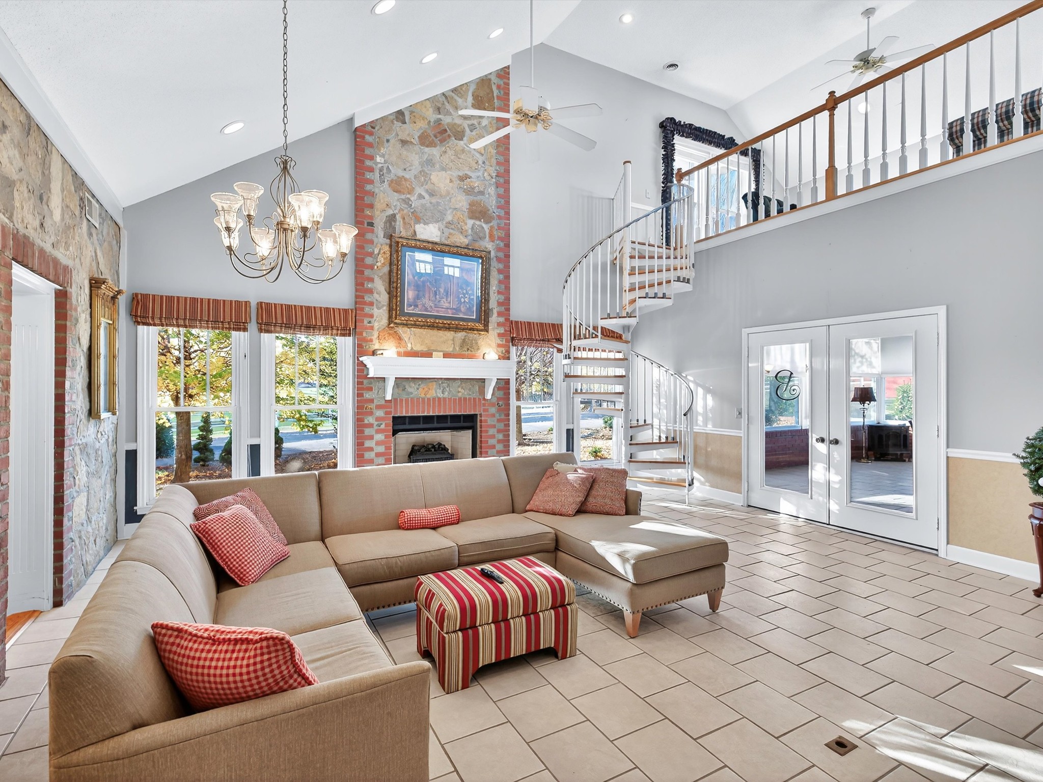 275 Swift Lane Cunningham, TN 37052 - Photo 25 of 67 a living room with furniture chandelier and a large window