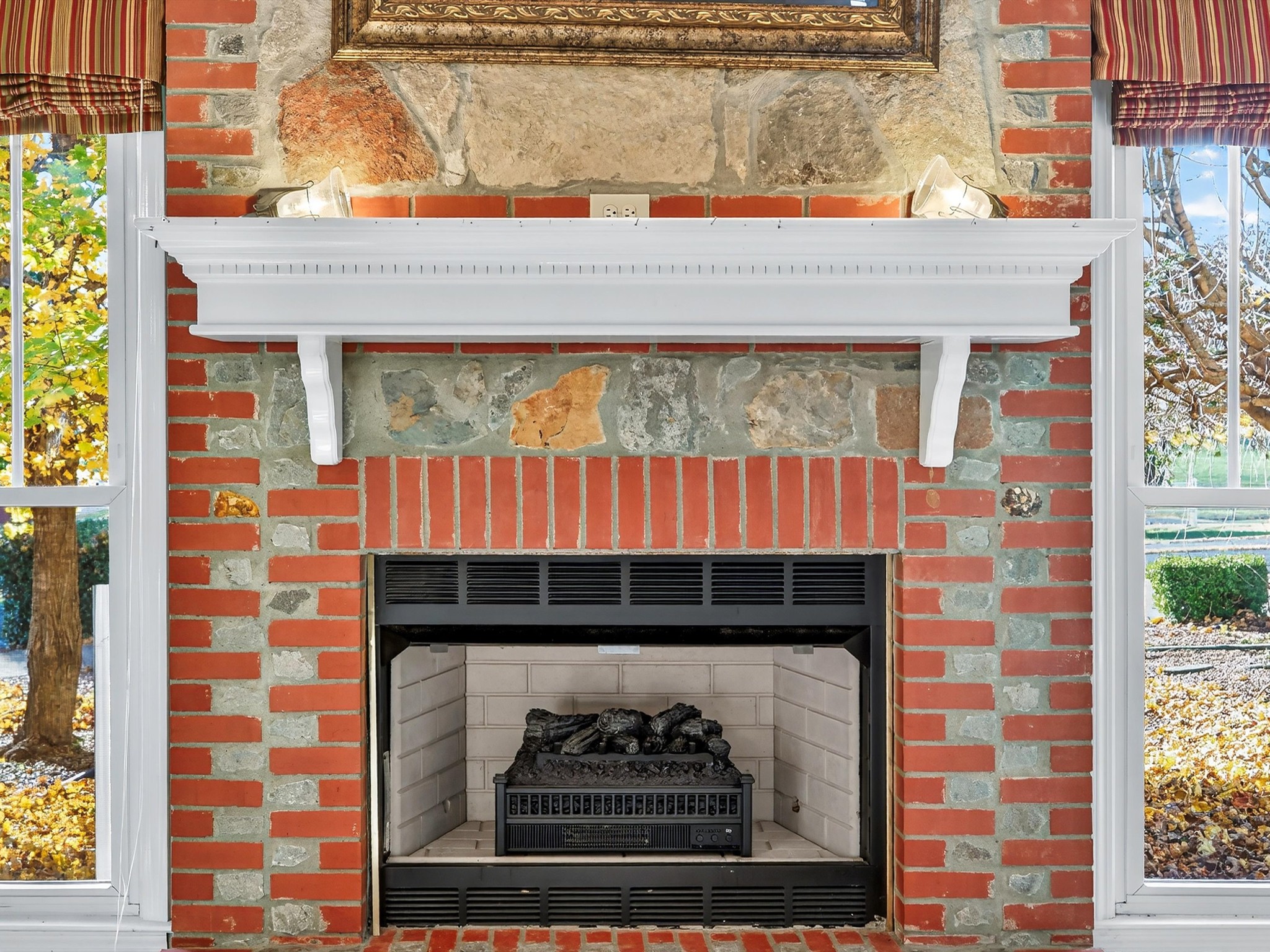 275 Swift Lane Cunningham, TN 37052 - Photo 27 of 67 a front view of a house with a fireplace and a window