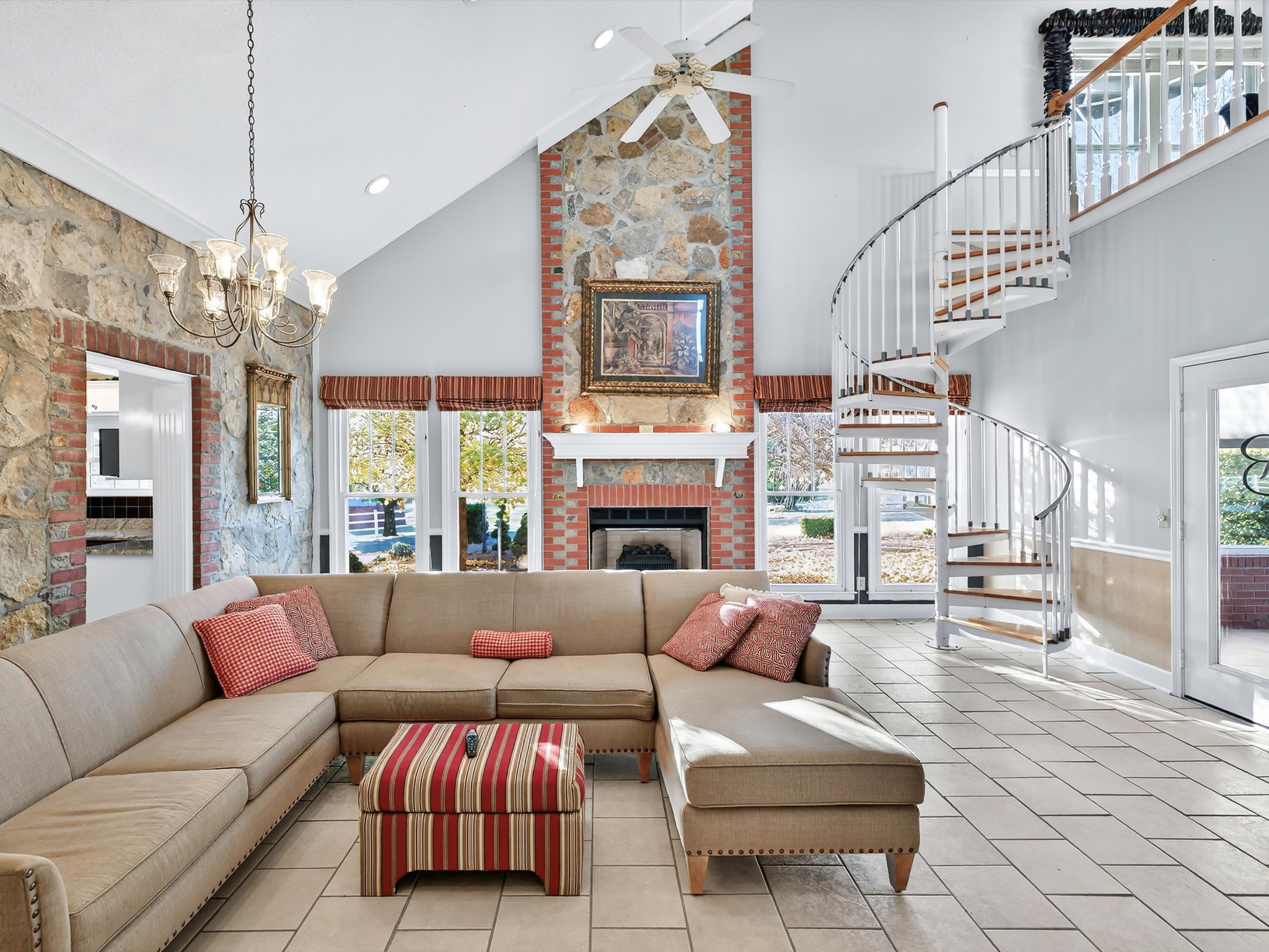 275 Swift Lane Cunningham, TN 37052 - Photo 30 of 67 a living room with furniture a large window and a chandelier