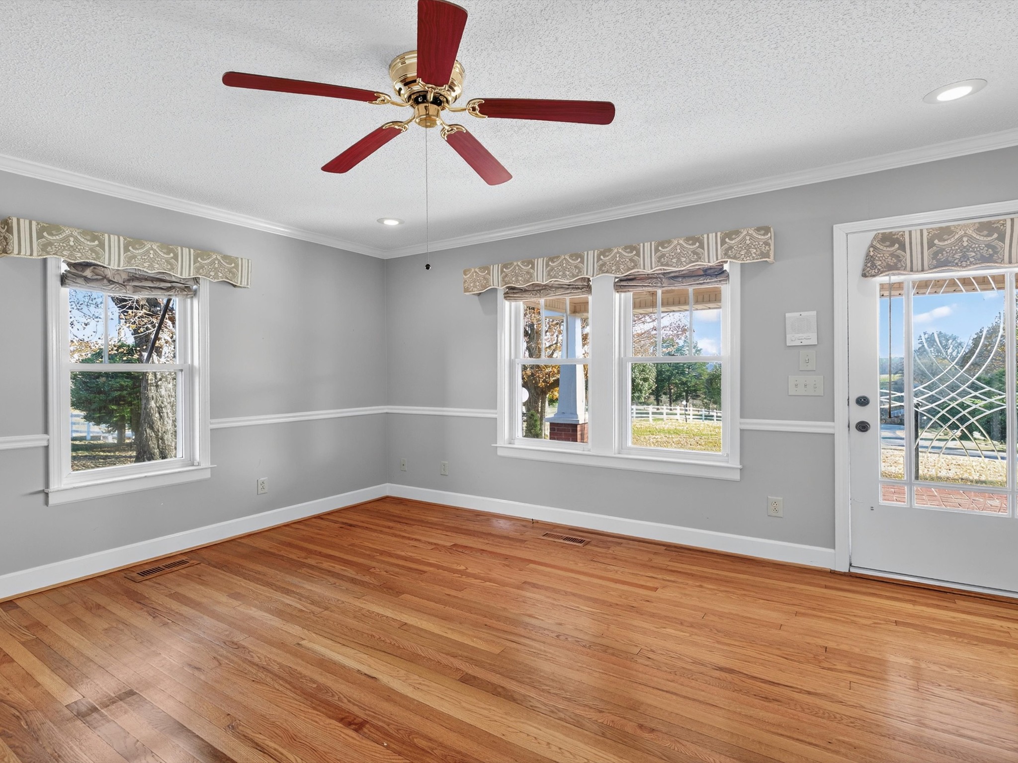 275 Swift Lane Cunningham, TN 37052 - Photo 40 of 67 a view of an empty room with wooden floor and a window