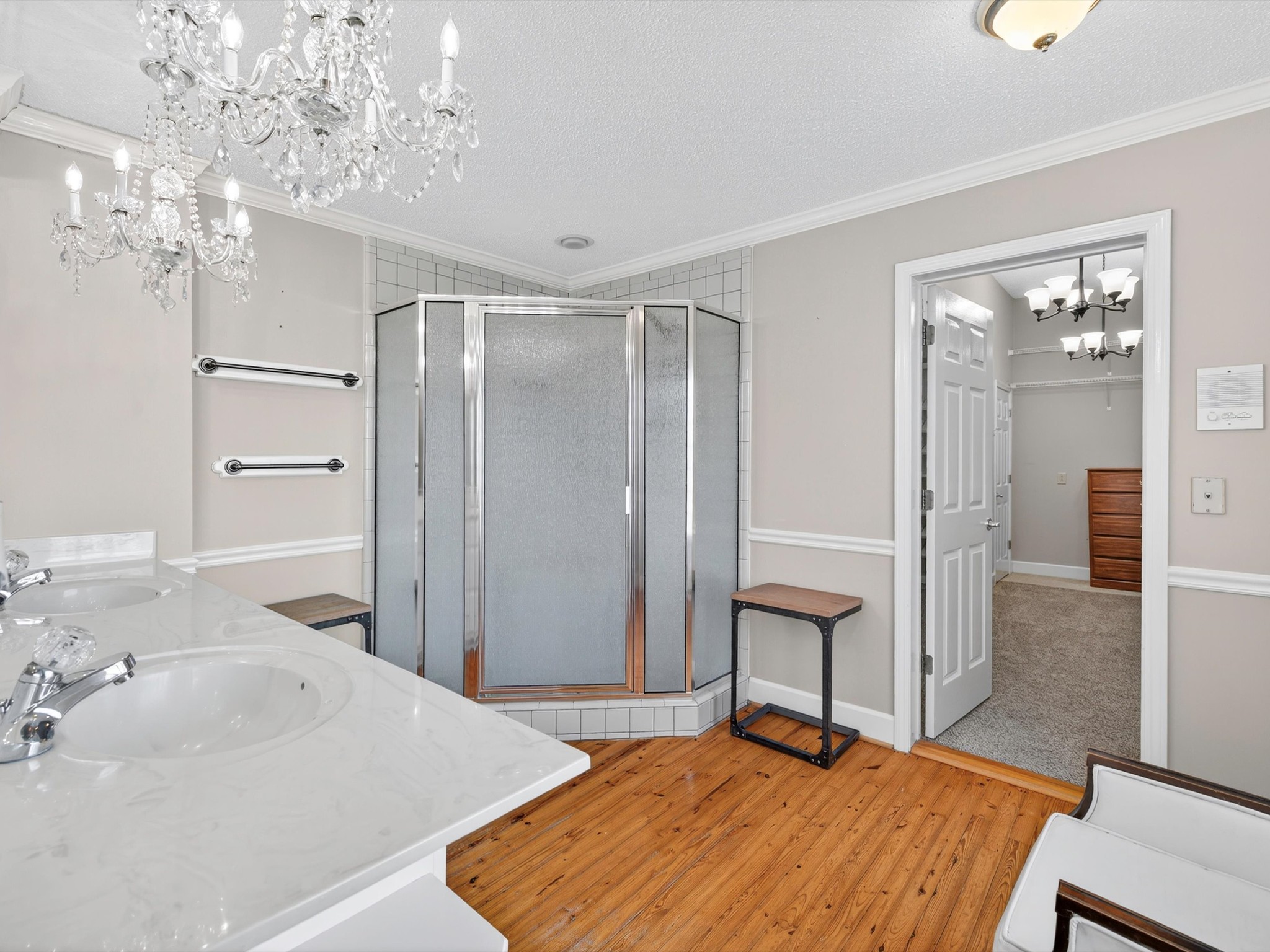 275 Swift Lane Cunningham, TN 37052 - Photo 44 of 67 a bedroom with a bed and a chandelier