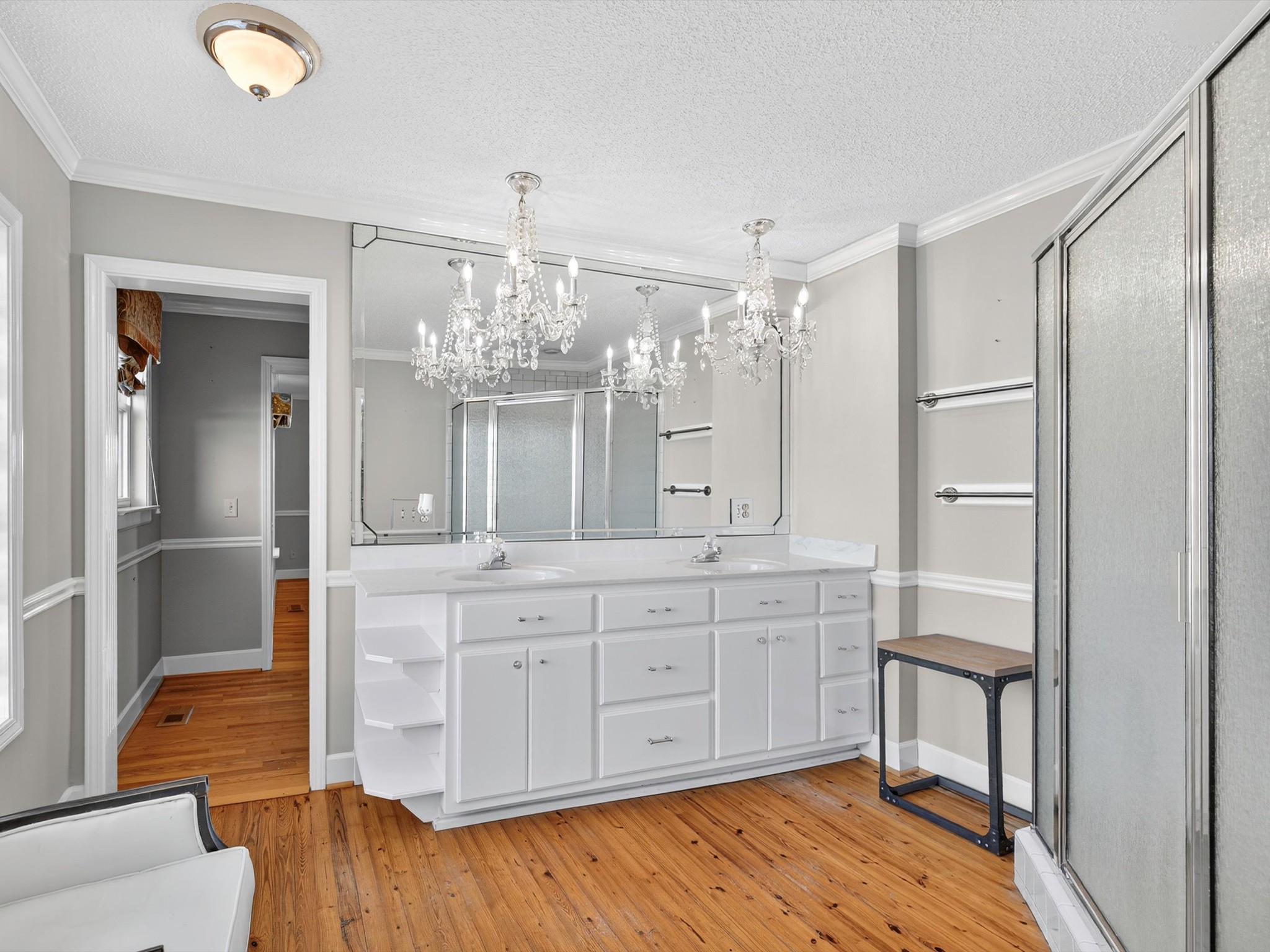 275 Swift Lane Cunningham, TN 37052 - Photo 45 of 67 a spacious bathroom with a granite countertop sink a mirror and a shower
