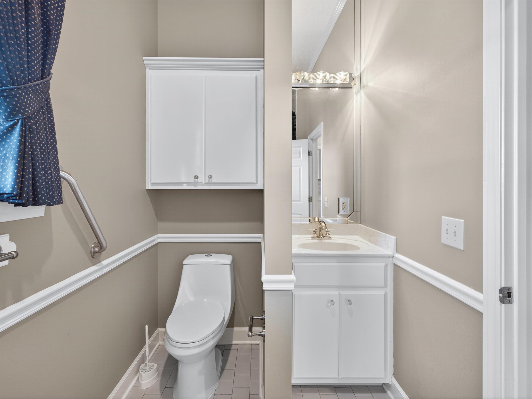 275 Swift Lane Cunningham, TN 37052 - Photo 53 of 67 a bathroom with a sink a toilet and mirror