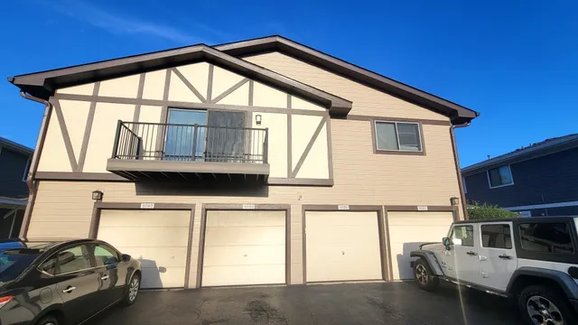 a view of garage with a table and chairs
