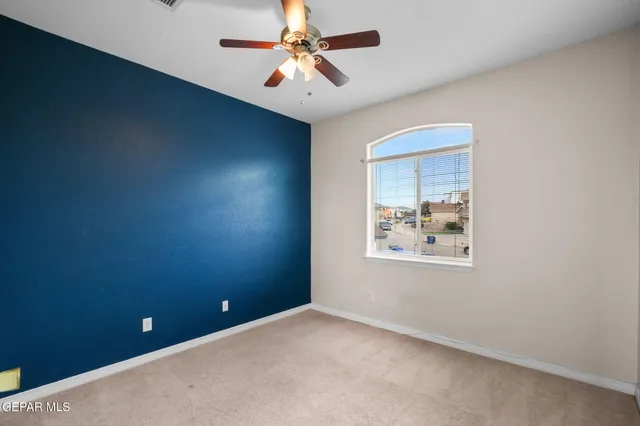a view of a balcony with chairs