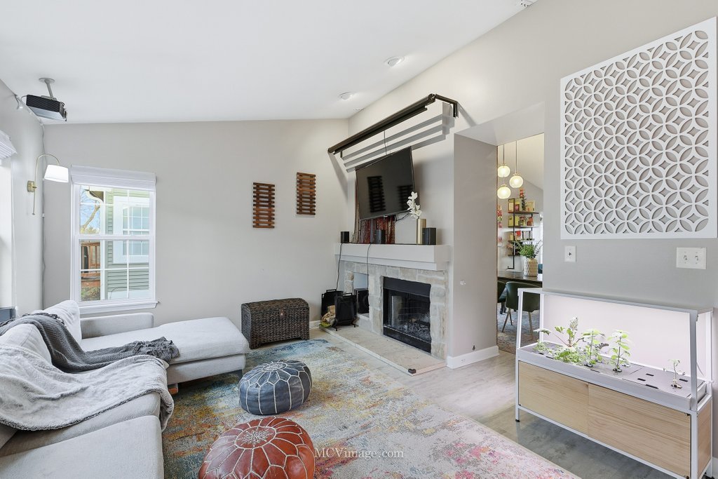 2460 Golf Ridge Circle, Unit 2460 Naperville, IL 60563 - Photo 14 of 25 a living room with furniture or couch and a fireplace