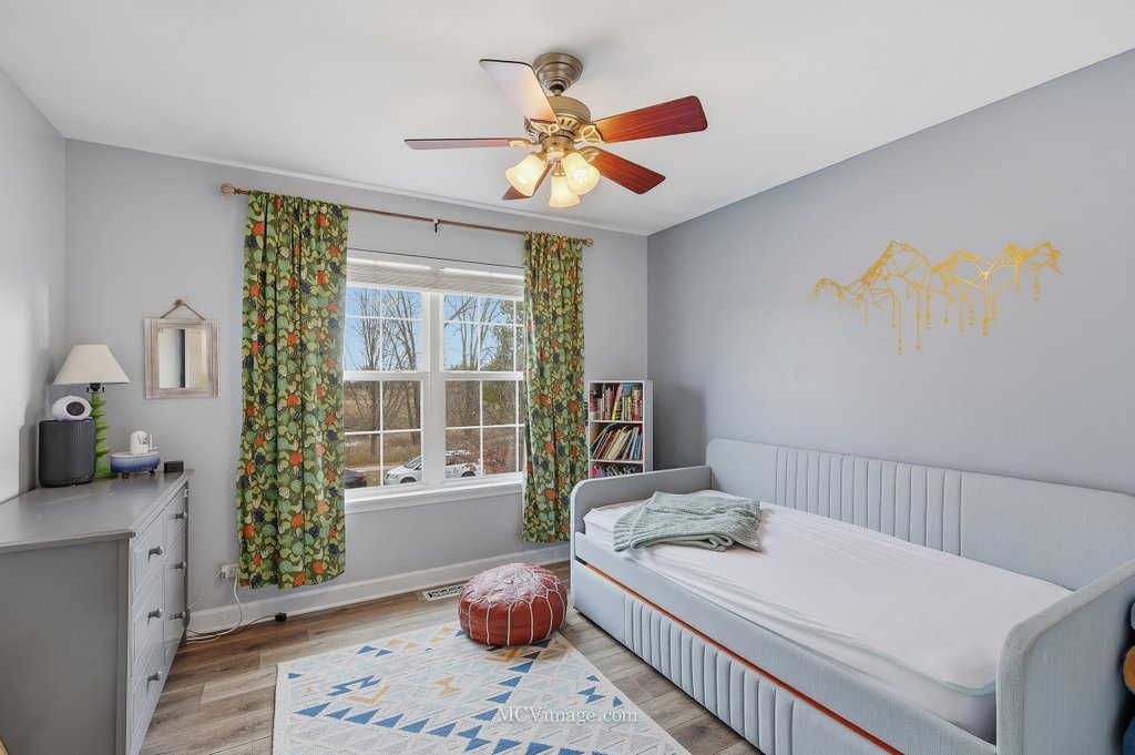 2460 Golf Ridge Circle, Unit 2460 Naperville, IL 60563 - Photo 17 of 25 a bedroom with a bed and a window