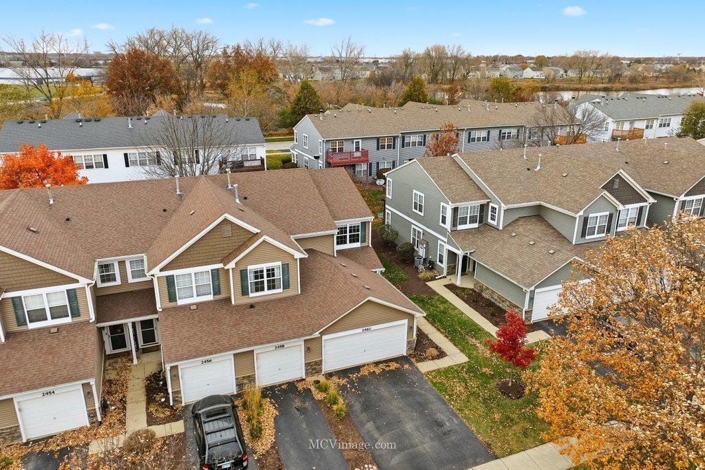 2460 Golf Ridge Circle, Unit 2460 Naperville, IL 60563 - Photo 2 of 25 an aerial view of a