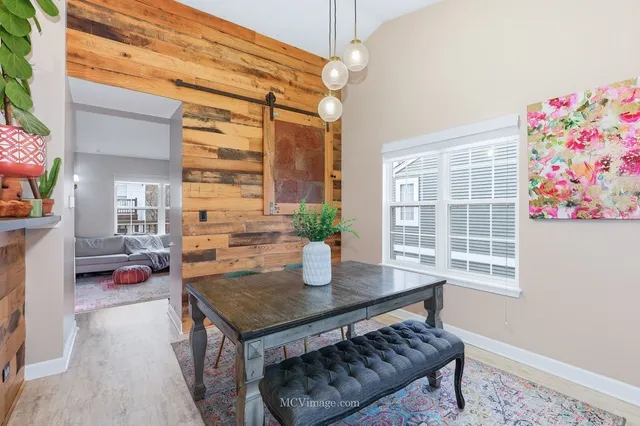 a living room with furniture and a table