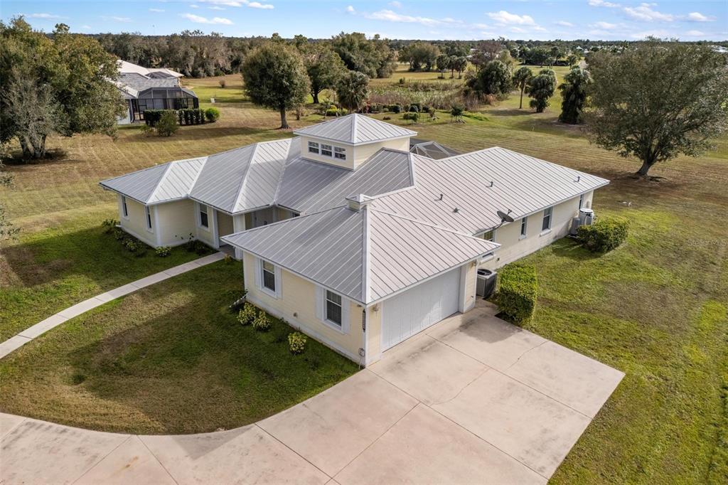 8069 Southwest Aviary Road Arcadia, FL 34269 - Photo 3 of 60 an aerial view of a house with big yard