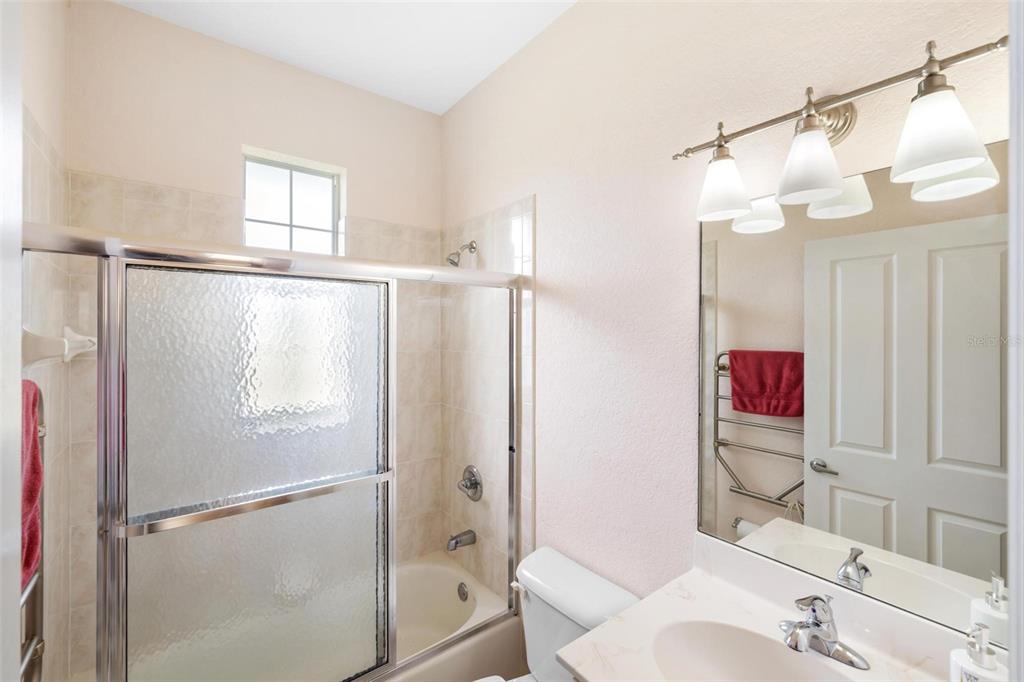 8069 Southwest Aviary Road Arcadia, FL 34269 - Photo 37 of 60 a bathroom with a sink and a mirror