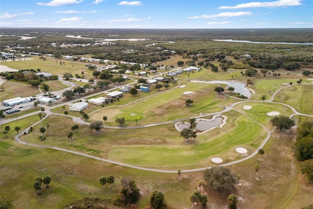 8069 Southwest Aviary Road Arcadia, FL 34269 - Photo 51 of 60 an aerial view of residential houses with outdoor space