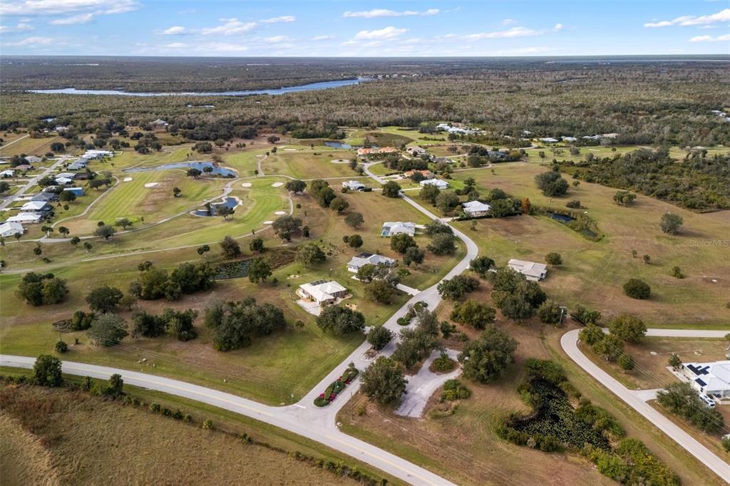 8069 Southwest Aviary Road Arcadia, FL 34269 - Photo 57 of 60 an aerial view of residential houses with outdoor space