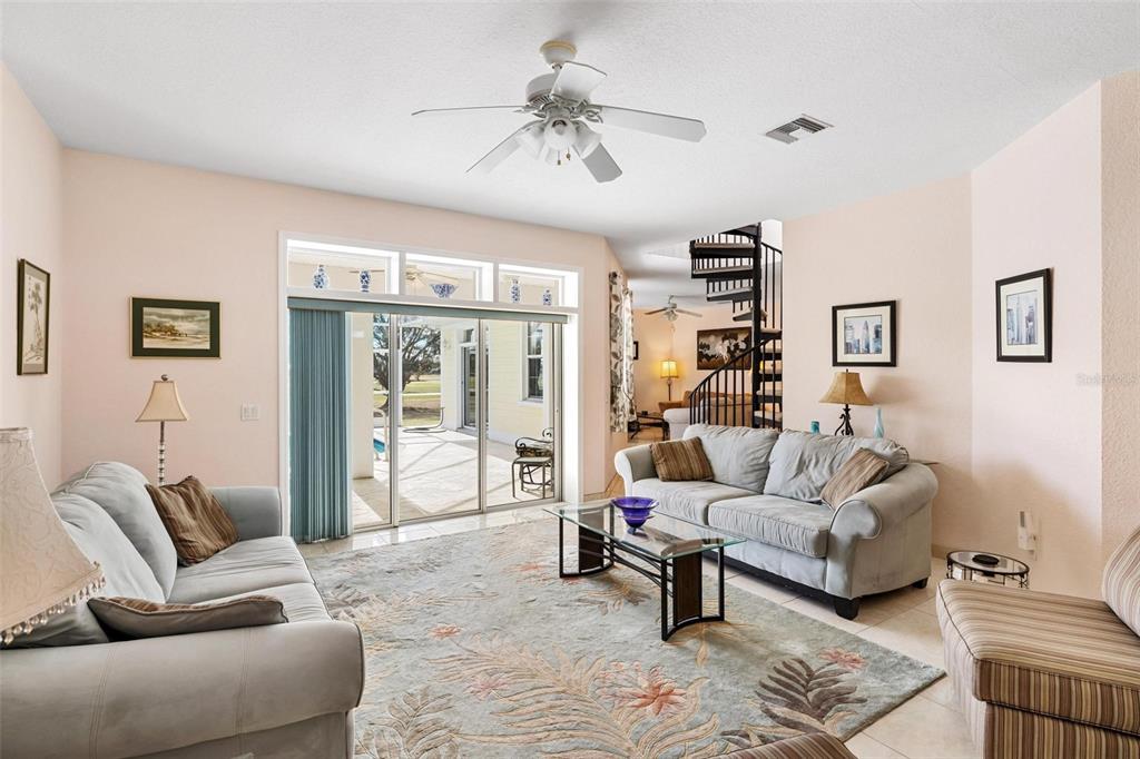 8069 Southwest Aviary Road Arcadia, FL 34269 - Photo 10 of 60 a living room with furniture and a large window