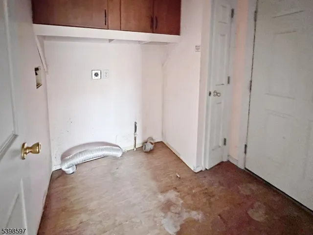 a view of a room with drop ceiling