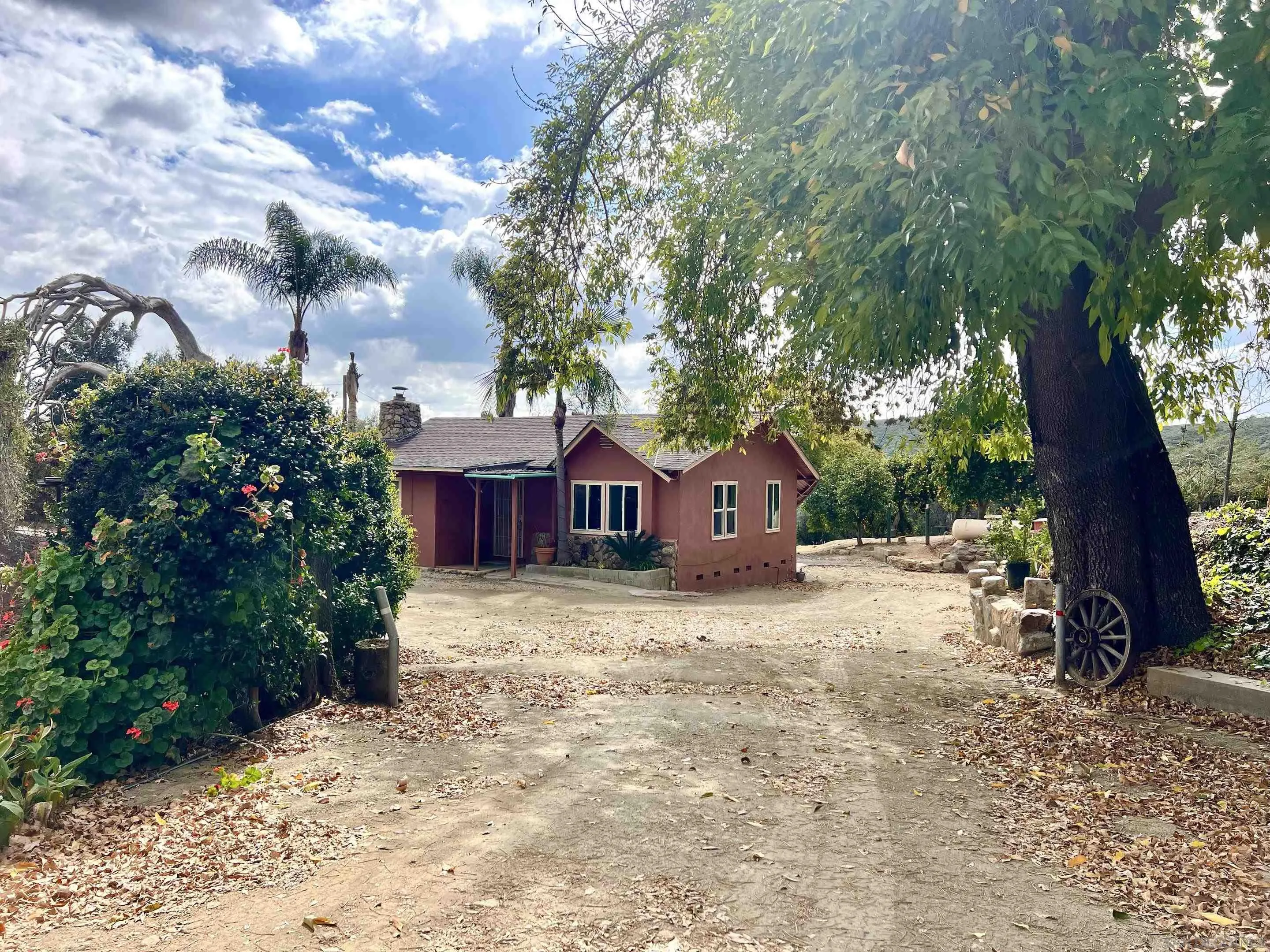 32500 Rincon Ranch Road Pauma Valley, CA 92061 - Photo 1 of 19 a view of a house with a yard covered in snow